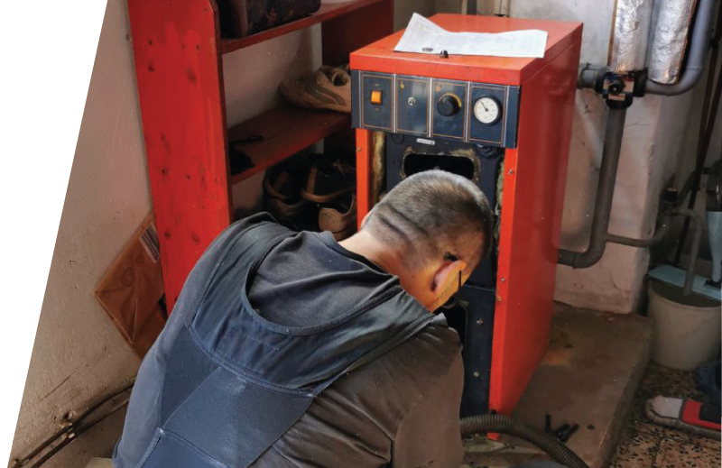 Furnace repairman working