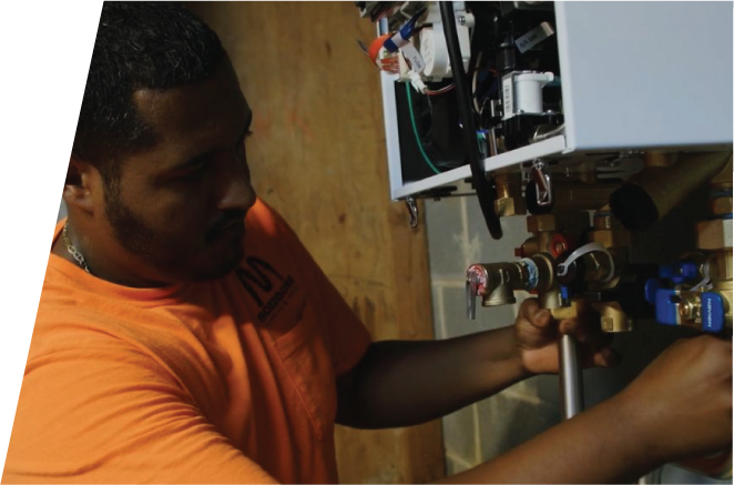 Plumber programming Navien tankless boiler