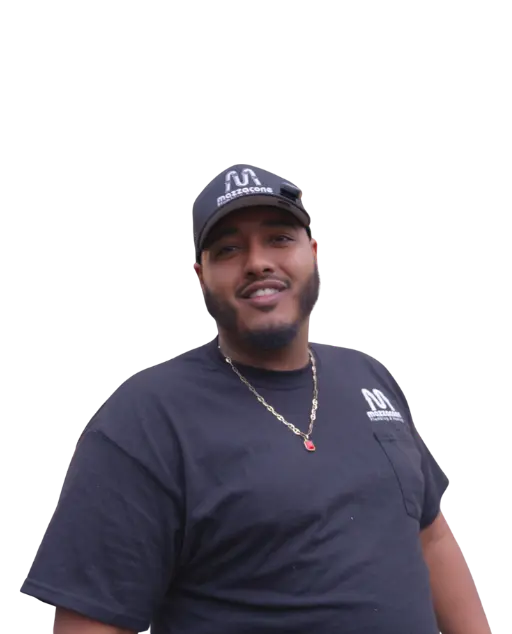 Mazzacone Plumbing plumber smiling with blue shirt and hat